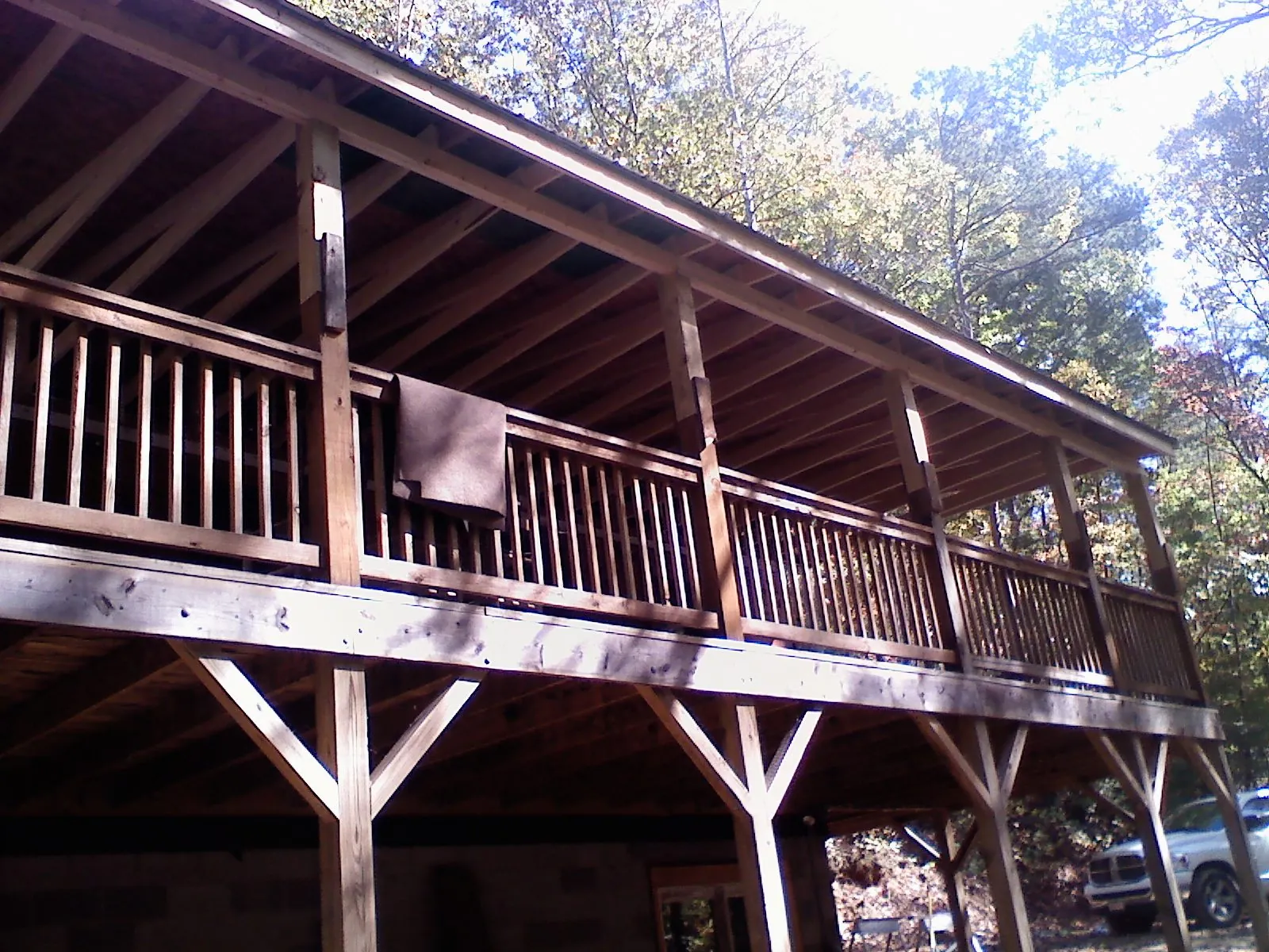 Timber framing under a new elevated porch and deck — Roof Leak Repair in New Germany by Roofing Brothers